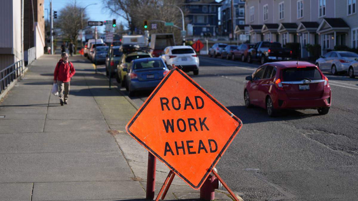 A “Road Work Ahead” sign.