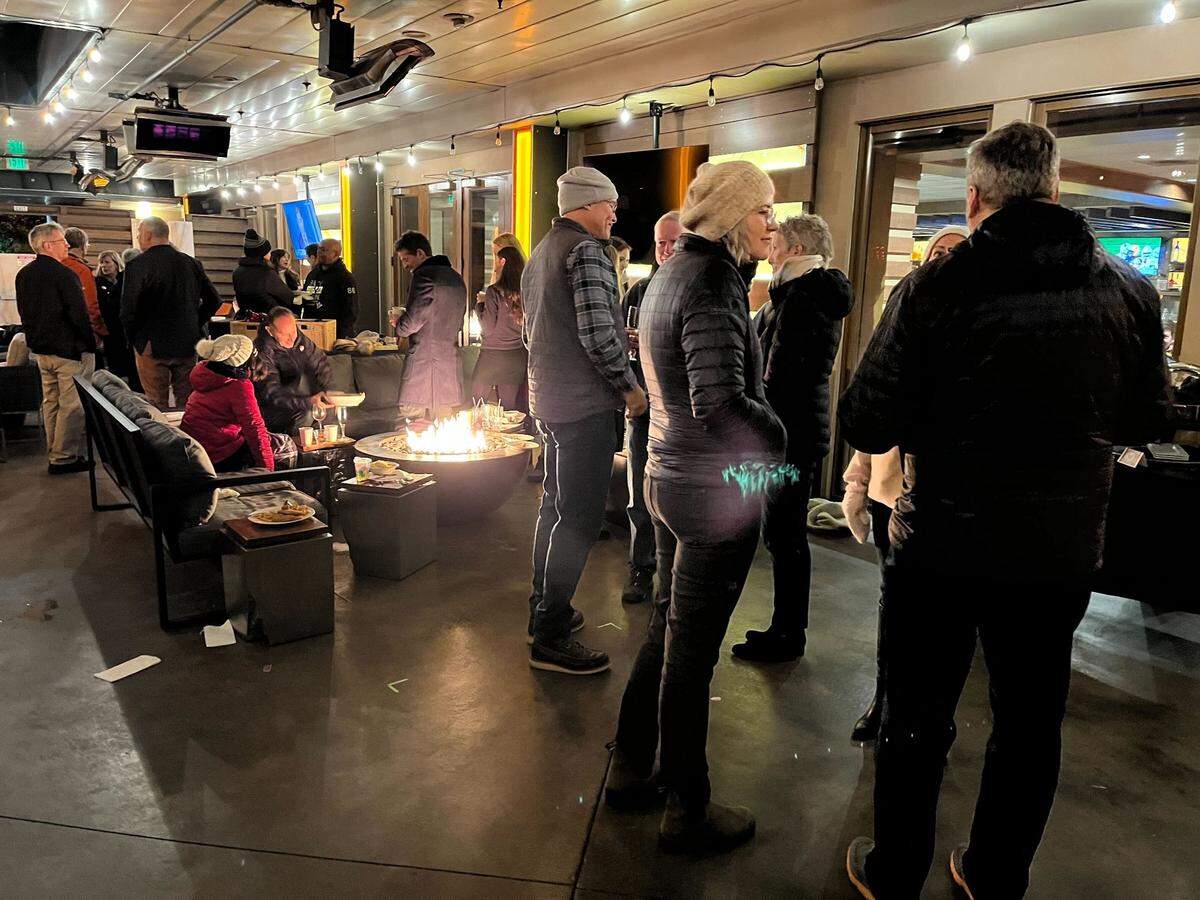 Supporters of Whatcom County Prop. 5, a property tax measure to fund child care, preschool and other programs and services for children and families, gather Election Night, Tuesday, Nov. 8, 2022, at B-Town Kitchen & Raw Bar at Four Points by Sheraton Bellingham Hotel & Conference Center in Bellingham, Wash.