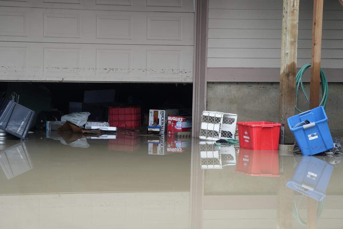 Belongings inside a garage were underwater on December 12, 2025, in Ferndale, Wash., after the Nooksack River flooded the area.