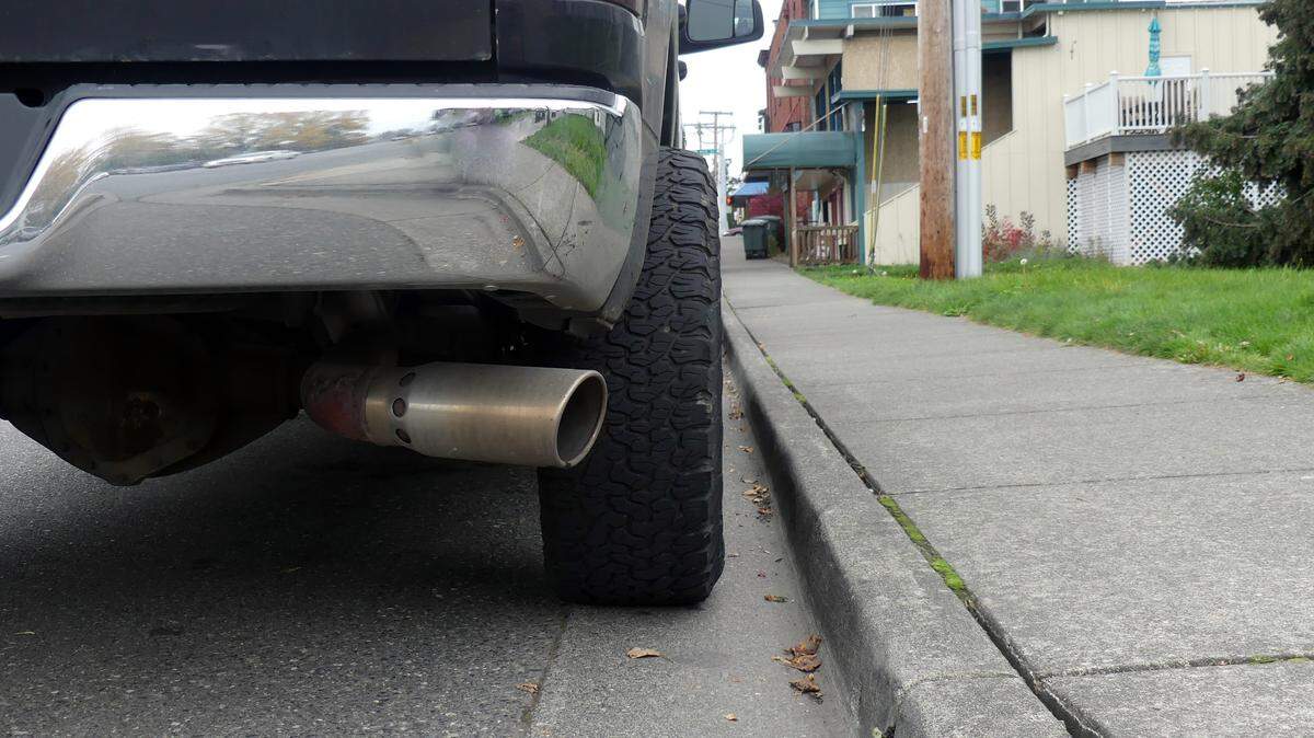 Is anything being done about cars and trucks with tires that stick out past their fenders? Is it legal?