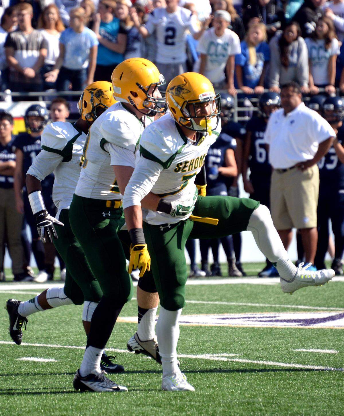 Sehome safety Taylor Rapp celebrates after scoring against Cascade Christian during a Sept. 5, 2015, game at Husky Stadium in Seattle. Rapp is expected to be taken early in the 2019 NFL Draft this weekend.