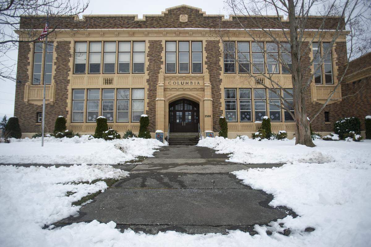 Snow was cleared from the Columbia Elementary School entrance on Thursday. School superintendents are still considering what Whatcom County schools will do to make up for school days that have been missed because of snow and ice.