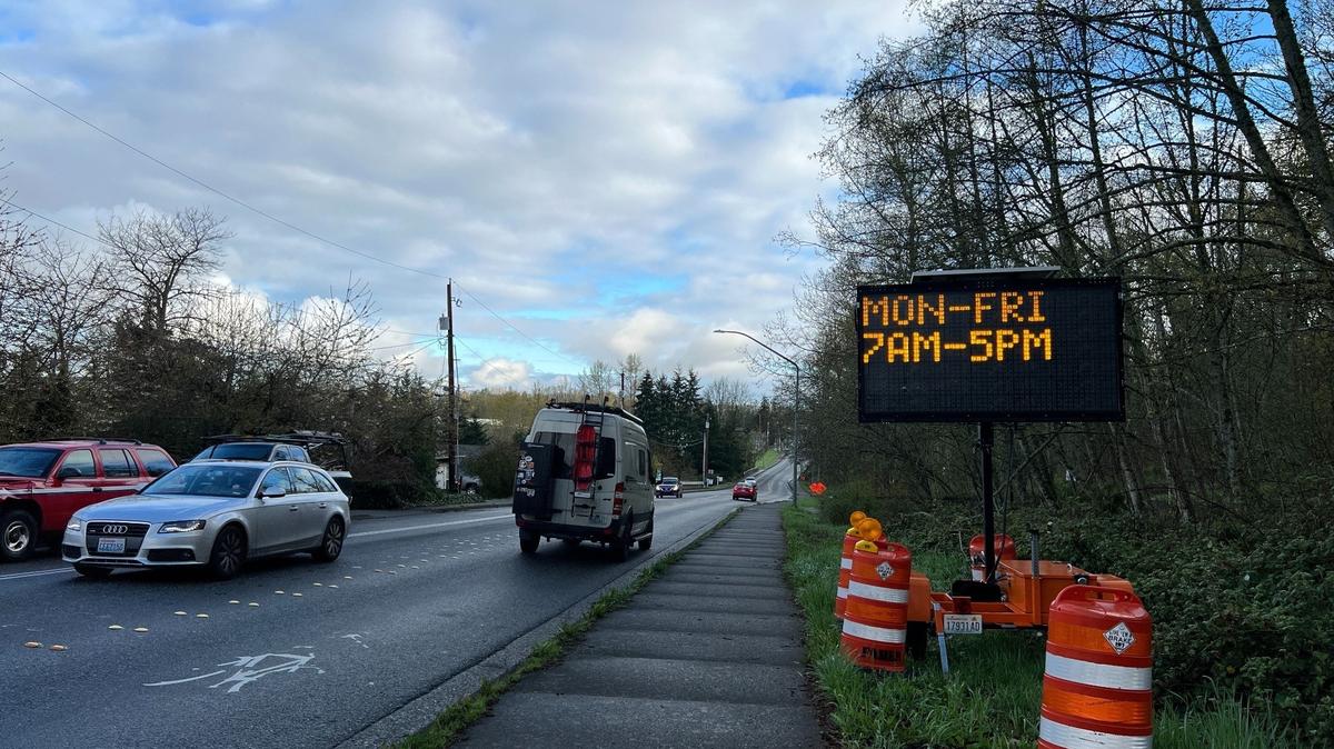 Drivers use Woburn Street south of Iowa Street on Monday, April 24. A sign warns that Yew Street will closed between Carolina and Texas streets from 7 a.m. to 5 p.m. this week. The work is part of a summer-long sewer project that will cause delays and detours along the Woburn Street commuter corridor.
