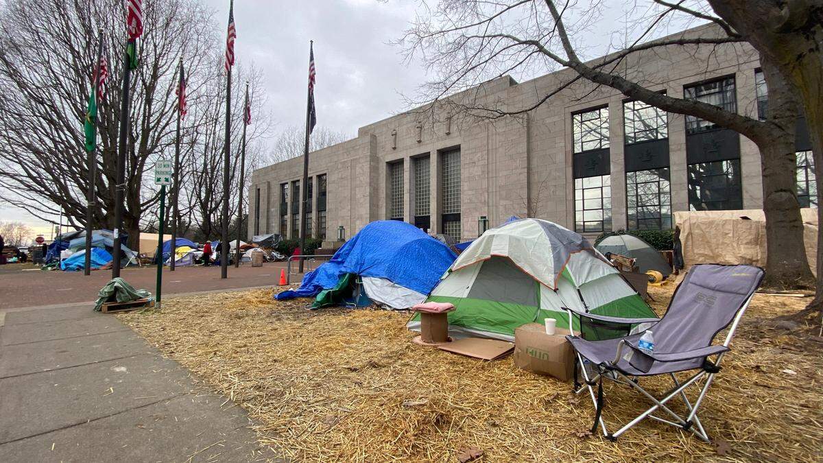 Tents sit outside Bellingham City Hall as part of Camp 210 on Wednesday, Jan. 20, 2021, in Bellingham. Camp 210 was a group of homeless campers living in tents on the lawns of City Hall (210 Lottie St.) and the Bellingham Public Library (210 Central Ave.). It was set up to protest the lack of shelter in the area. More shelter space and a public-relations campaign should get more homeless into shelters this year and avoid protests of last year, Bellingham and Whatcom officials say.