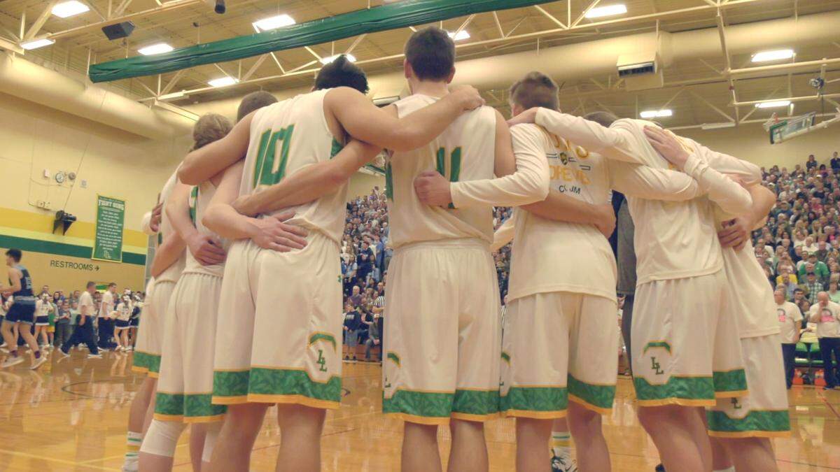 Lynden basketball players huddle before the Lynden vs. Lynden Christian basketball game at Lynden High School on Jan. 25.
