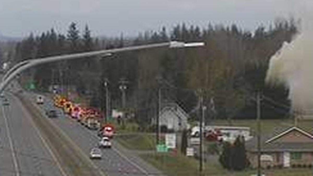 Whatcom County firefighters are battling a mobile home fire Tuesday, March 30, at the Hidden Village RV Park and Campground south of Lynden along Guide Meridian.