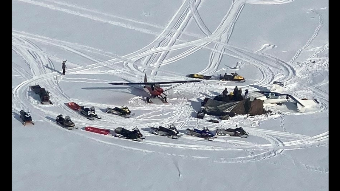 This is the site of the crash after ground responders began to arrive via air craft and snow mobile.