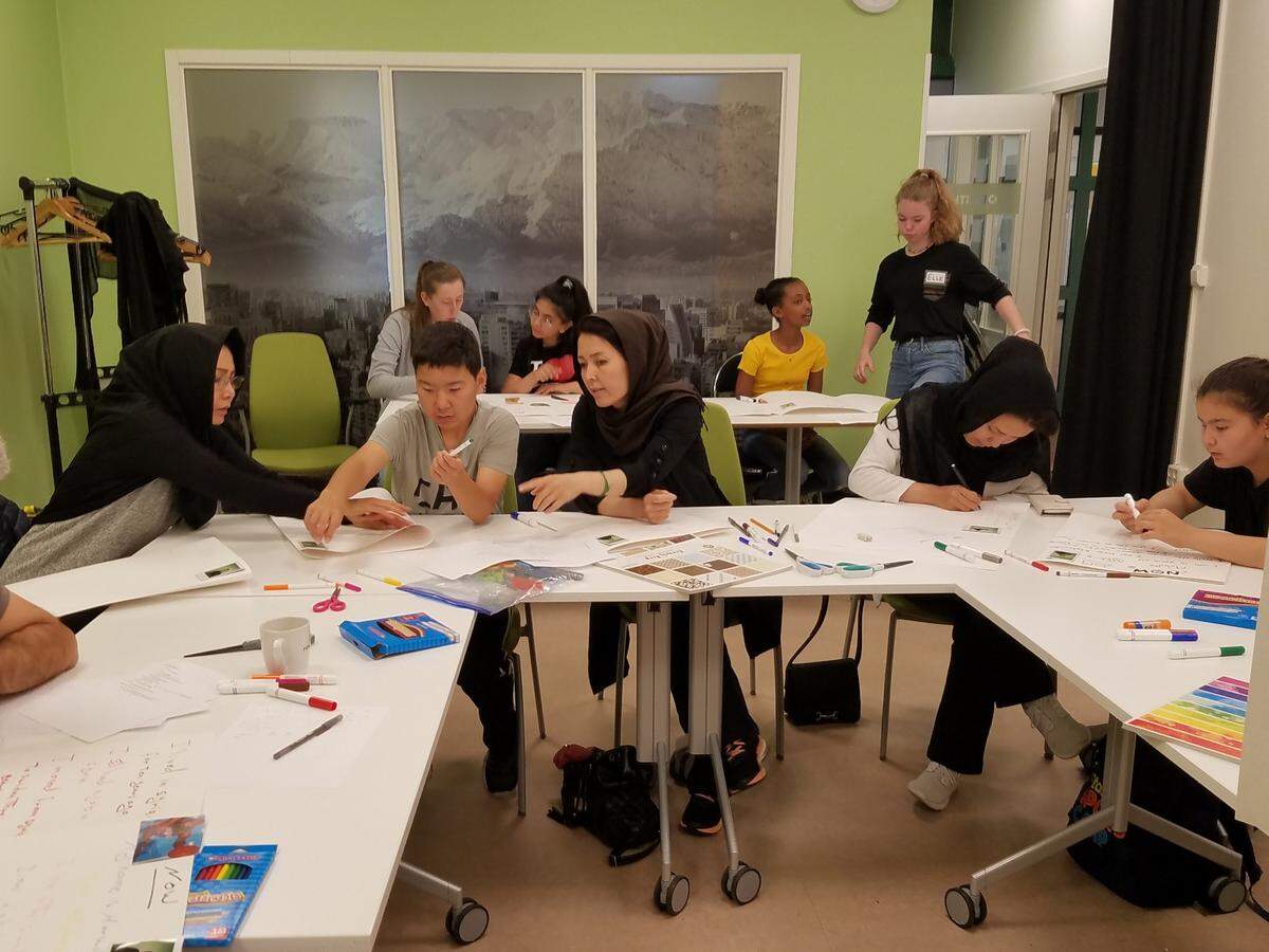 Afghan refugees attend a class in 2019 in Norrkoping, Sweden, with representatives of Bellingham Covenant Church in Bellingham.