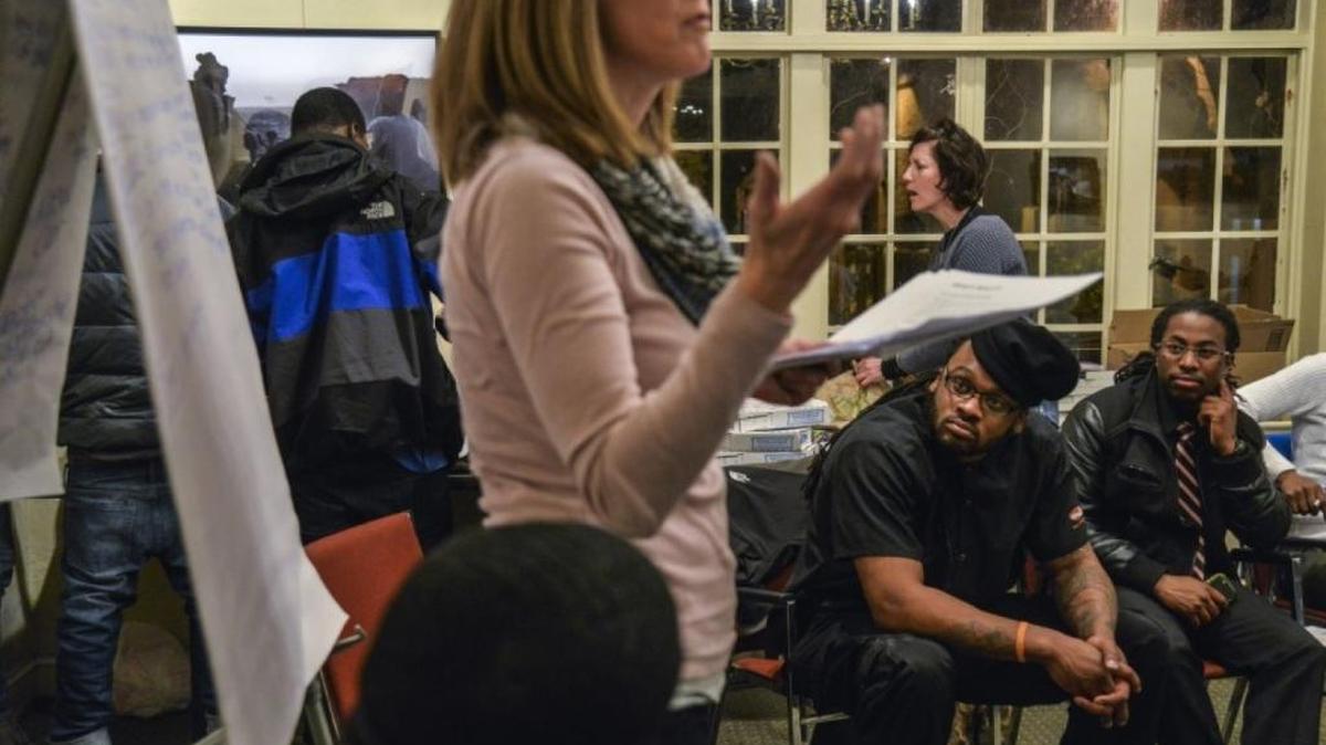Kelli Taylor, co-founder of Free Minds, leads a group of members in a reading/writing workshop. Free Minds is a book club that, according to its Web site, “uses books, creative writing, and peer support to awaken DC youth incarcerated as adults to their own potential.”