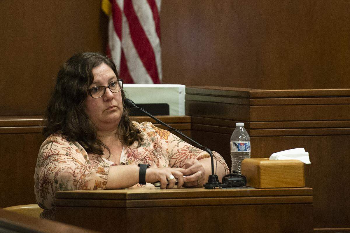 Kim Wagner, a coworker of Timothy Bass at the Franz Bakery and turned in evidence with Bass’ DNA on it, listens as an attorney asks a question during her testimony in Whatcom County Superior Court on May 16.