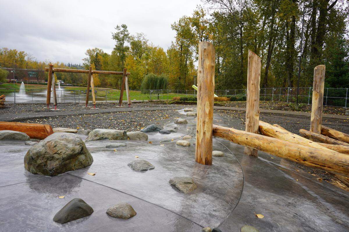 Development continues at Barkley Village’s new Scramble Nature Play Park Thursday, Nov. 3, in Bellingham. The park is made entirely of natural elements for children to scramble and climb on.