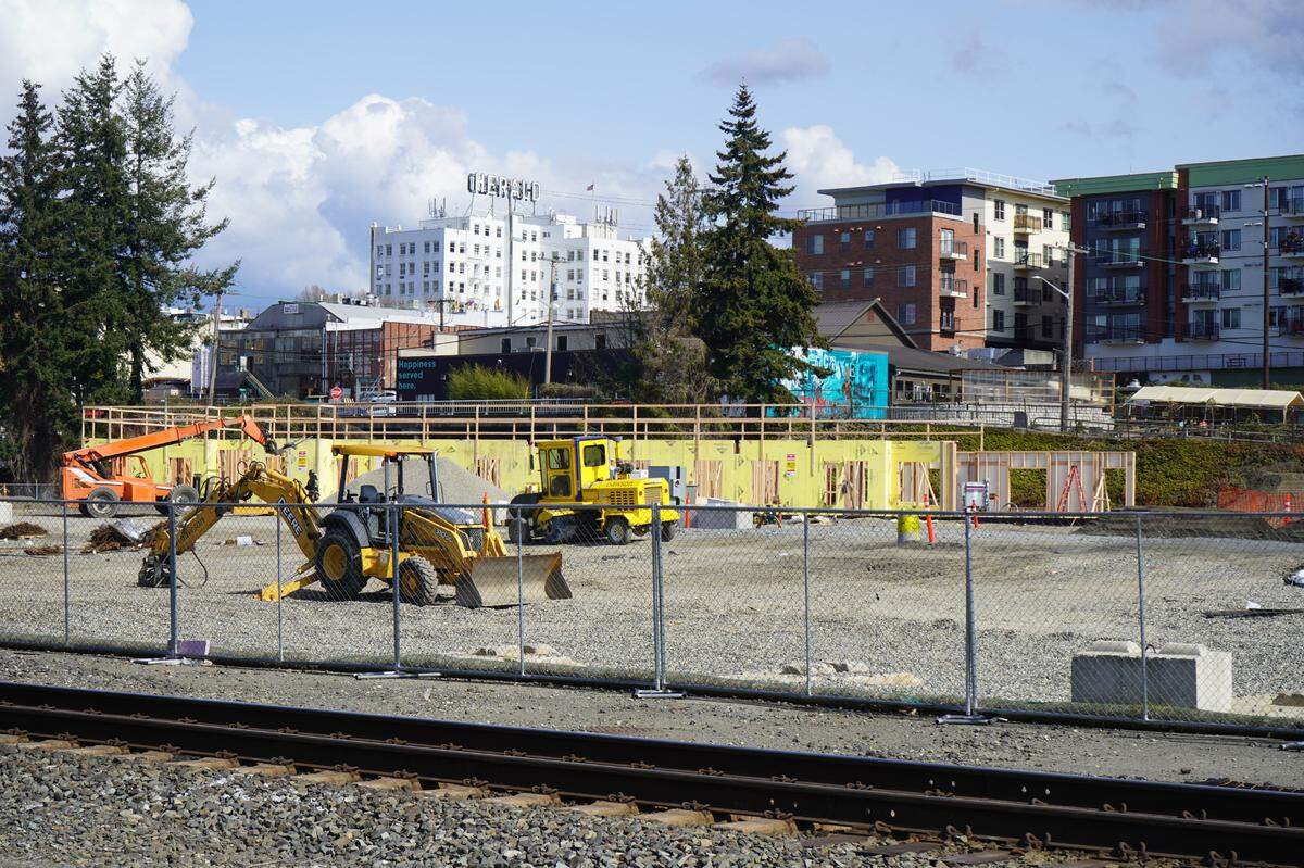 Construction continues at The Millworks Family Housing project on Friday, April 14, in Bellingham. The railroad line runs along one side of the property that will provide affordable housing and childcare.