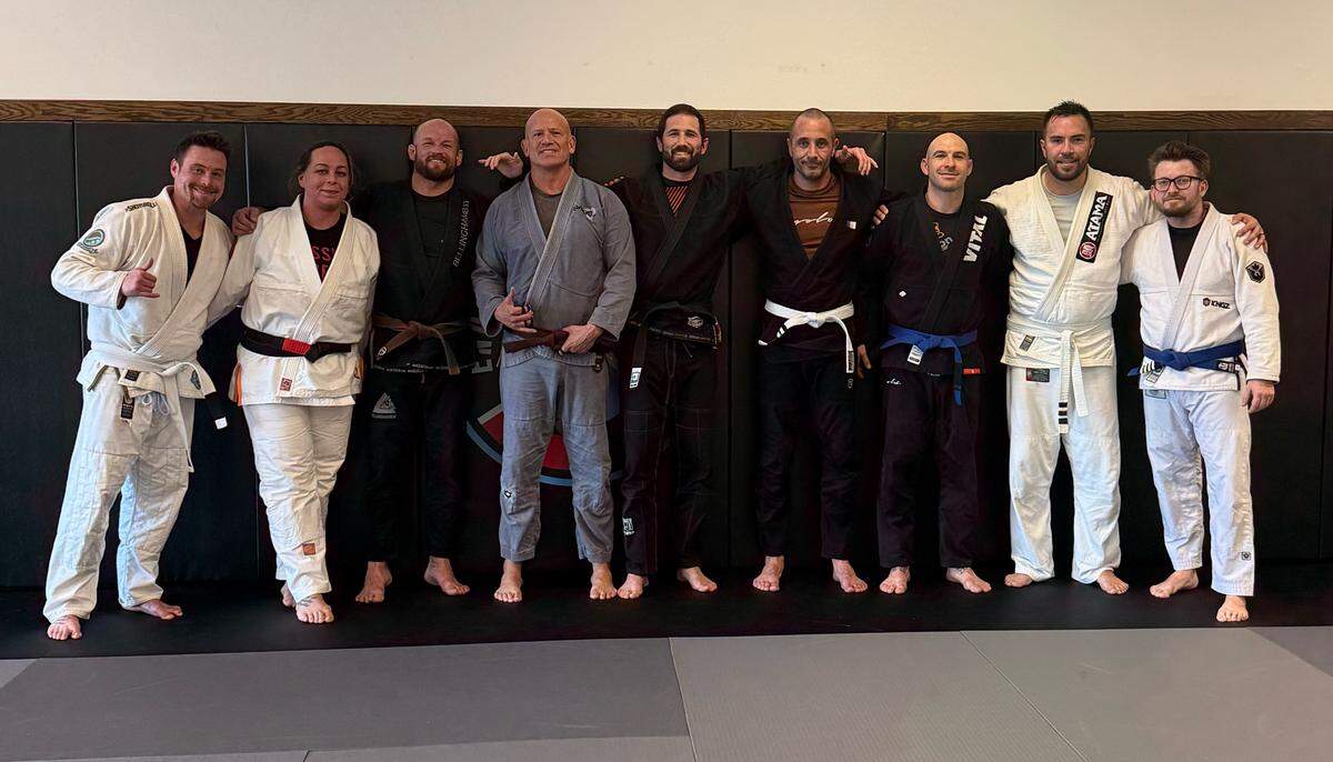 Endurance Jiu Jitsu owner Andrew Marshall (center) and jiu jitsu students. 