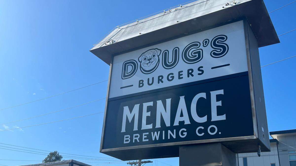 A sign for Doug’s Burgers stands outside the restaurant’s brick-and-mortar business on July 18, 2025, in Bellingham, Wash.