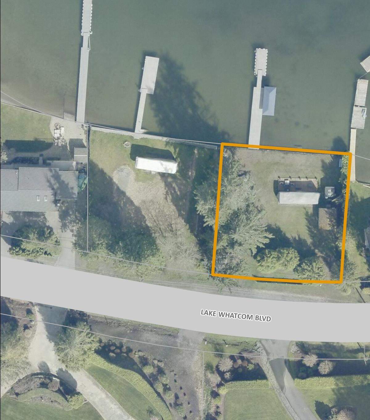 The city of Bellingham is buying two parcels of waterfront property, including the 0.23-acre property highlighted in this image, for $1.26 million and plans to return it to a natural state as part of protecting the Lake Whatcom watershed.