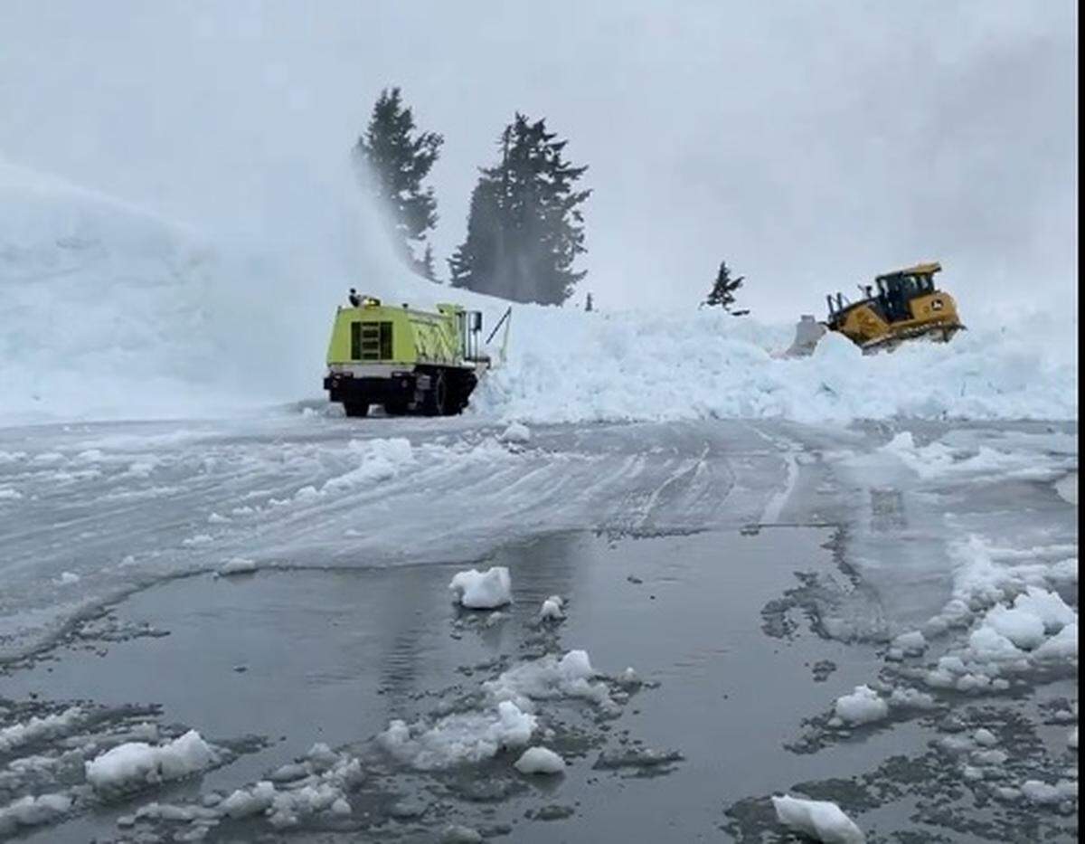 Washington State Department of Transportation crews work to clear the last of winter’s snow from the parking lot at Artist Point in an image released on the first day of summer, Thursday, June 209, 2024.