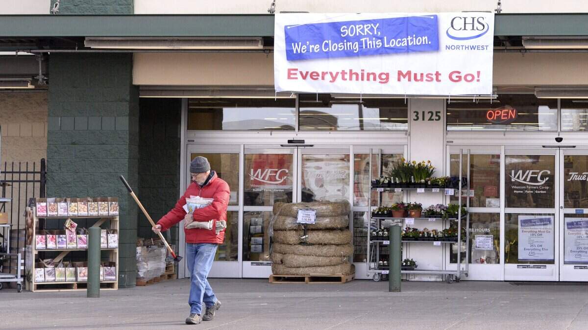 Customer Jack Henderson leaves the Whatcom Farmers Co-op store on Old Fairhaven Parkway in Bellingham, Tuesday, Feb. 20, 2018. The store recently closed and a proposal has been made to add around 80 apartment units on top of the building.