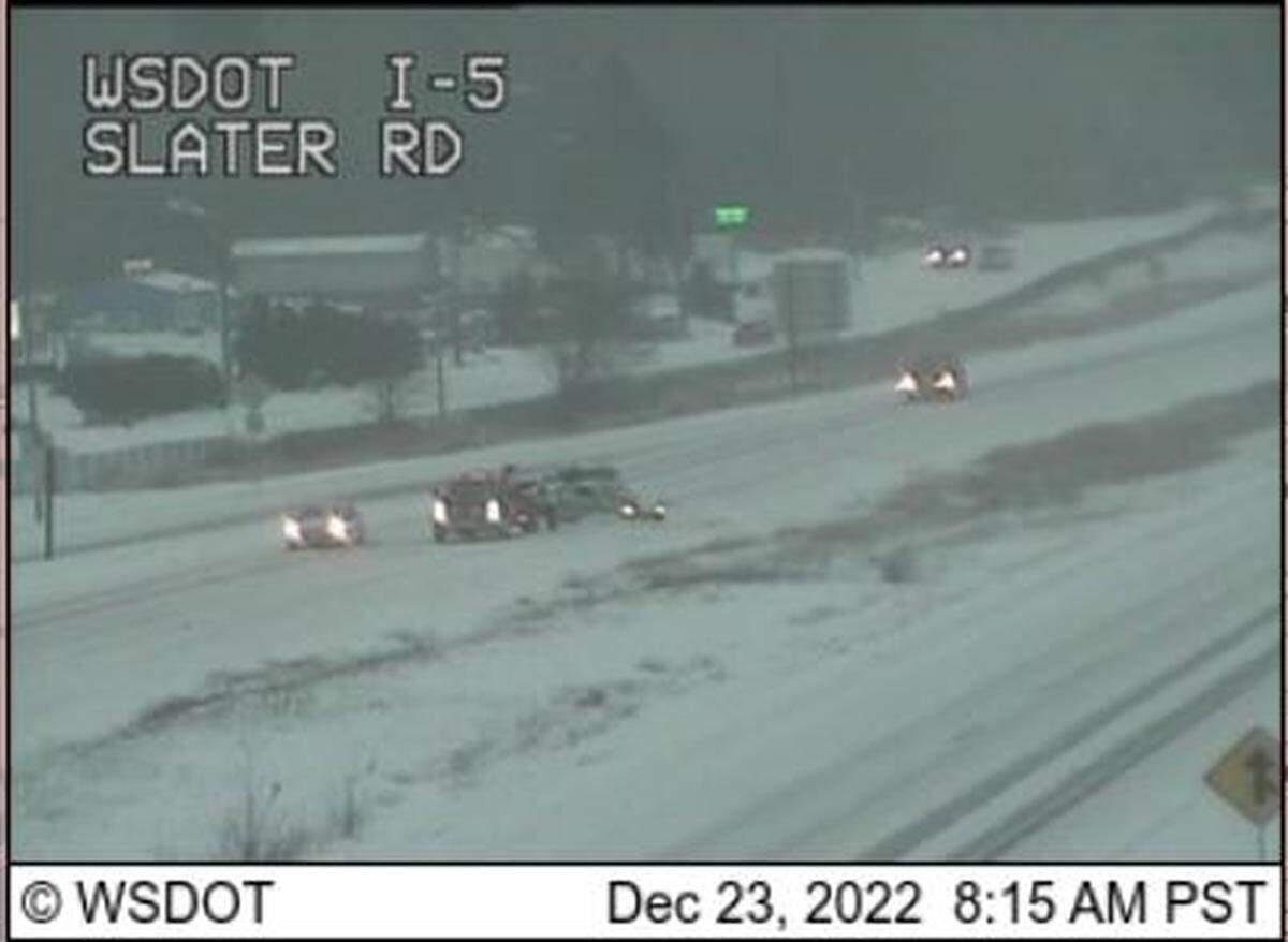 A collision blocks the left lane of Interstate 5 northbound at Slater Road at 8 a.m. Friday, Dec. 23, in Whatcom County. The Washington State Department of Transportation advised limiting all non-essential travel due to freezing rain and icy conditions on roadways.