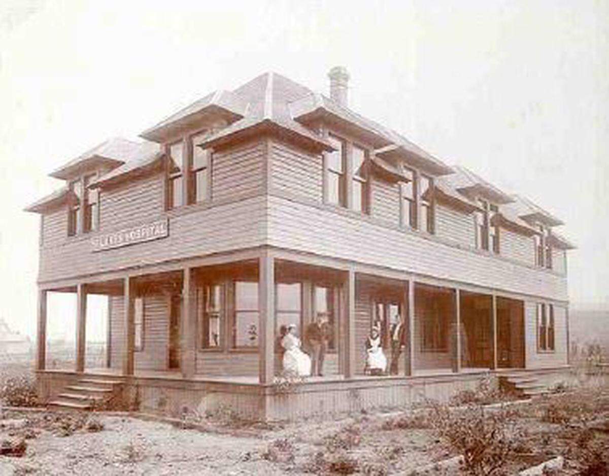 This photo, circa 1895, shows the original St. Luke's Hospital building at the foot of Sehome Hill. St. Luke's first opened in 1892 in the unused Grand Central Hotel at Holly and Forest streets but needed a smaller, more affordable space. Bellingham Bay Improvement Co. donated three lots at Chestnut and Jersey streets. Construction began in late 1894, and St. Luke's opened in its new home in January 1895.