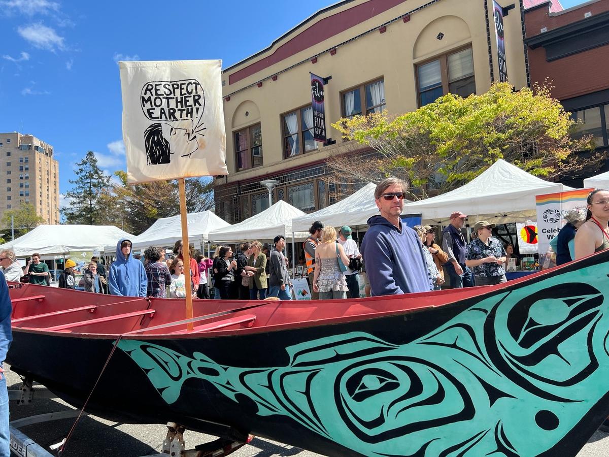A Coast Salish canoe was on display at an Earth Day rally and festival sponsored by Children of the Setting Sun on Bay Street in downtown Bellingham on Tuesday, April 22, 2025.