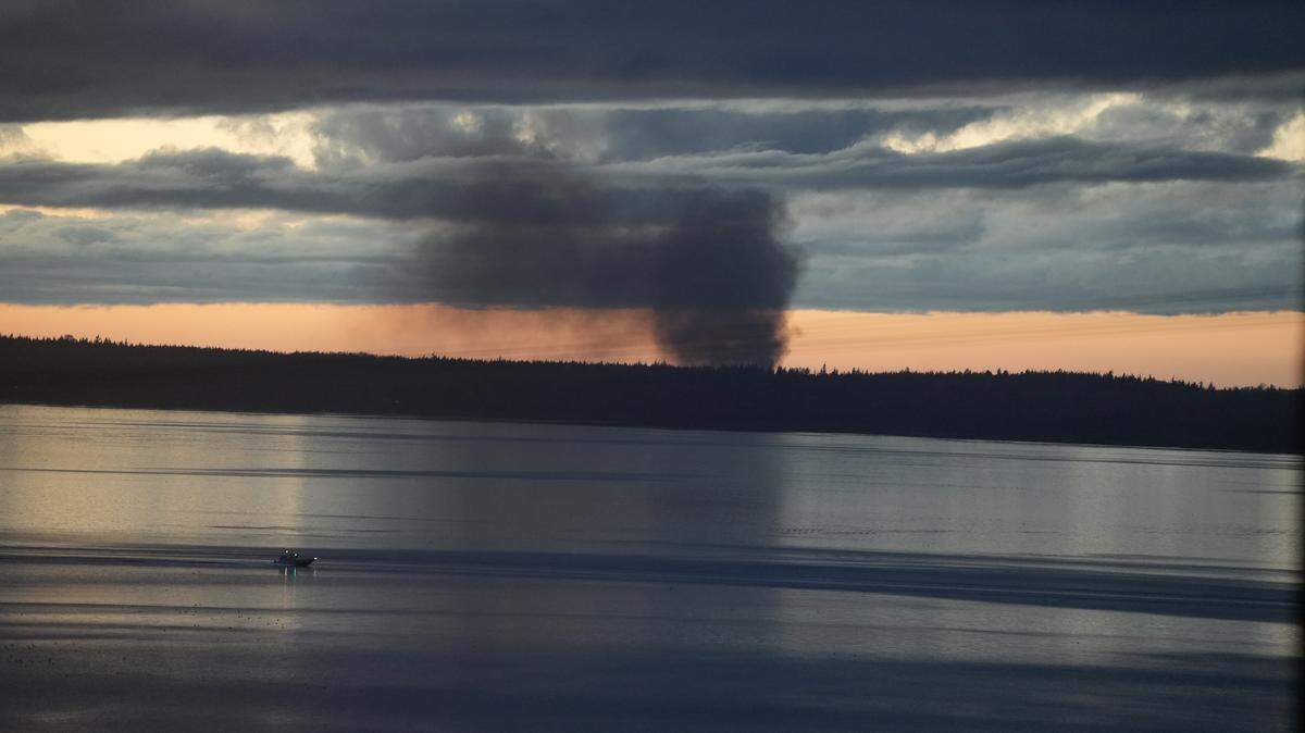 Smoke from a garage fire at a residence near Sandy Point was visible Thursday evening, November 13, 2025, across the bay from Bellingham, Wash.