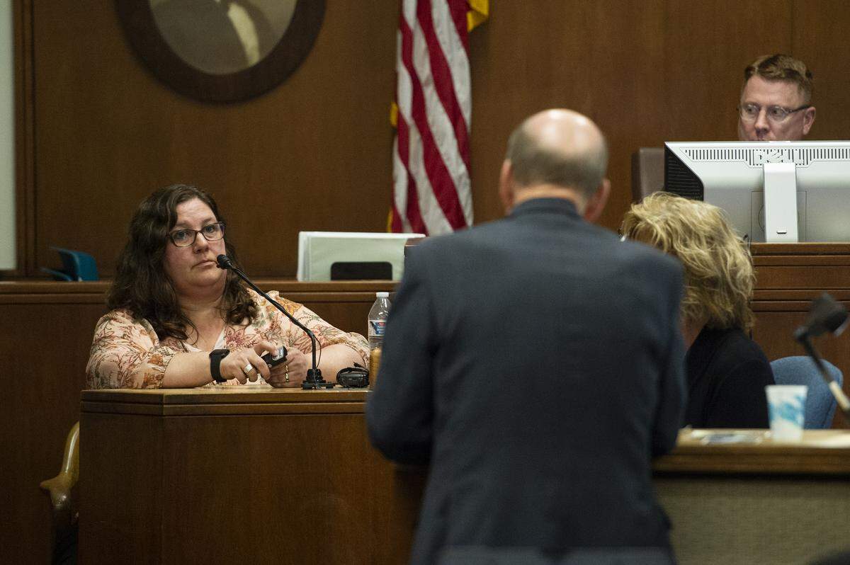 Kim Wagner, a fellow coworker of Timothy Bass at the Franz Bakery who turned in evidence with Bass’ DNA on it, listens as special prosecuting attorney David McEachran asks a question during her testimony Thursday in Whatcom County Superior Court.