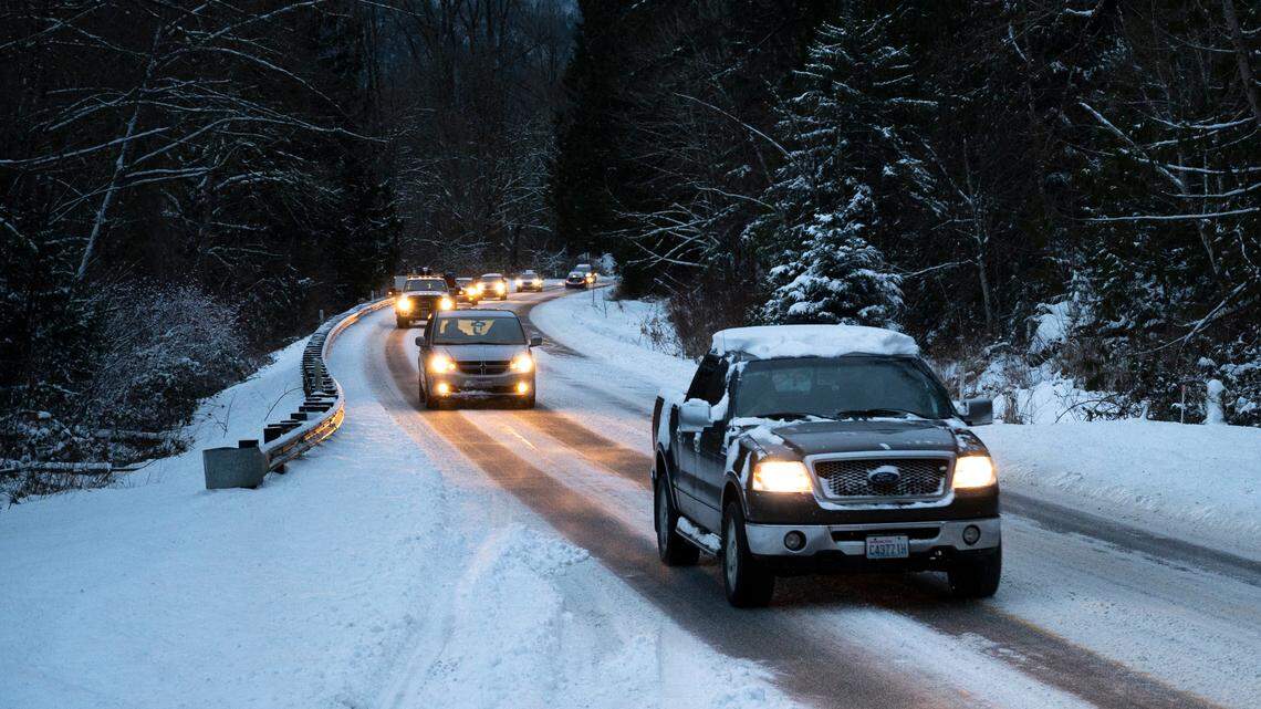 Cars travel east on Highway 542 towards Mount Baker early on Thursday, Jan. 6, 2022, in Whatcom County, Wash.