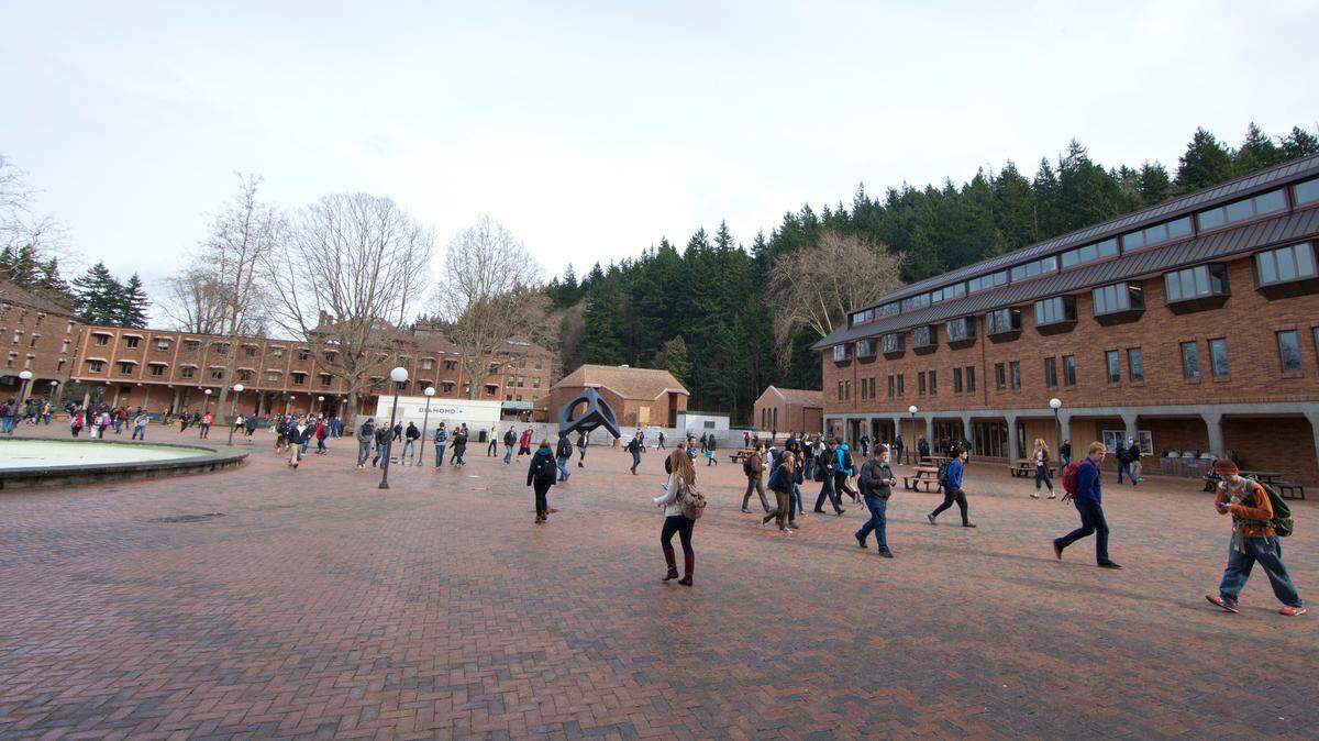 Western Washington University students walking to class in Red Square in 2013. Two people were treated and released at the Western Washington University Student Health Center after reportedly eating pasta that included marijuana at an on-campus protest of Aramark Friday.
