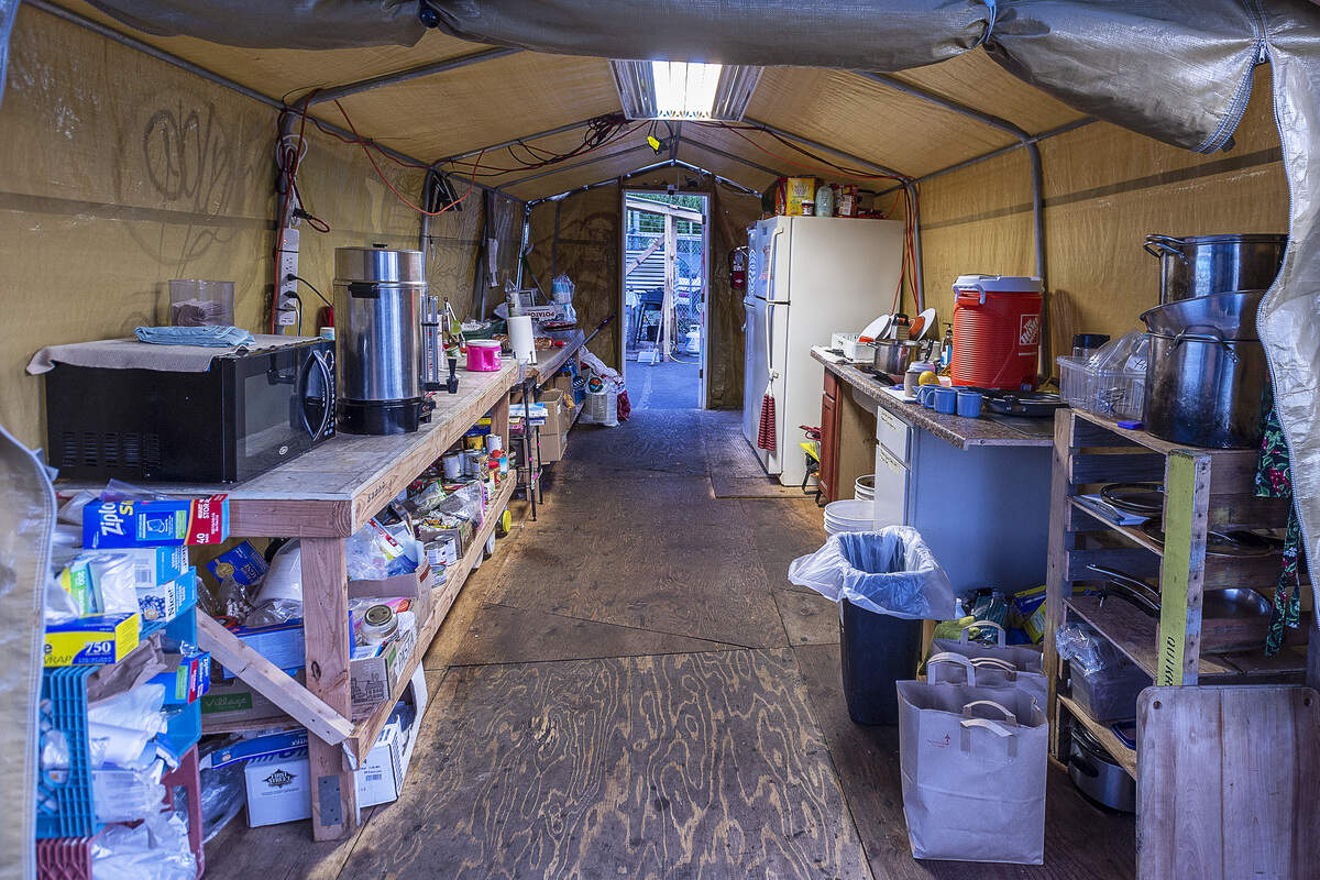Kitchen facilities, including a cooking area, are provided at the Safe Haven homeless encampment provided by HomesNOW! in the back lot of 620 Alabama Street in Bellingham, Wash., on Monday May 6, 2019.