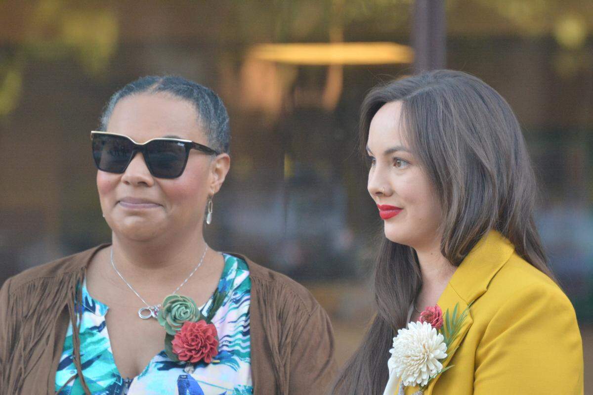 Bellingham City Councilwoman Kristina Michele Martens, left, and Shu-Ling Zhao of the Chuckanut Health Foundation addressed about 100 people outside the Bellingham Public Library before the Whatcom County Council meeting Tuesday, Oct. 11, where the panel voted to establish a countywide Racial Equity Commission. Martens and Zhao were key members of a committee that sought public input and outlined how the commission would work.