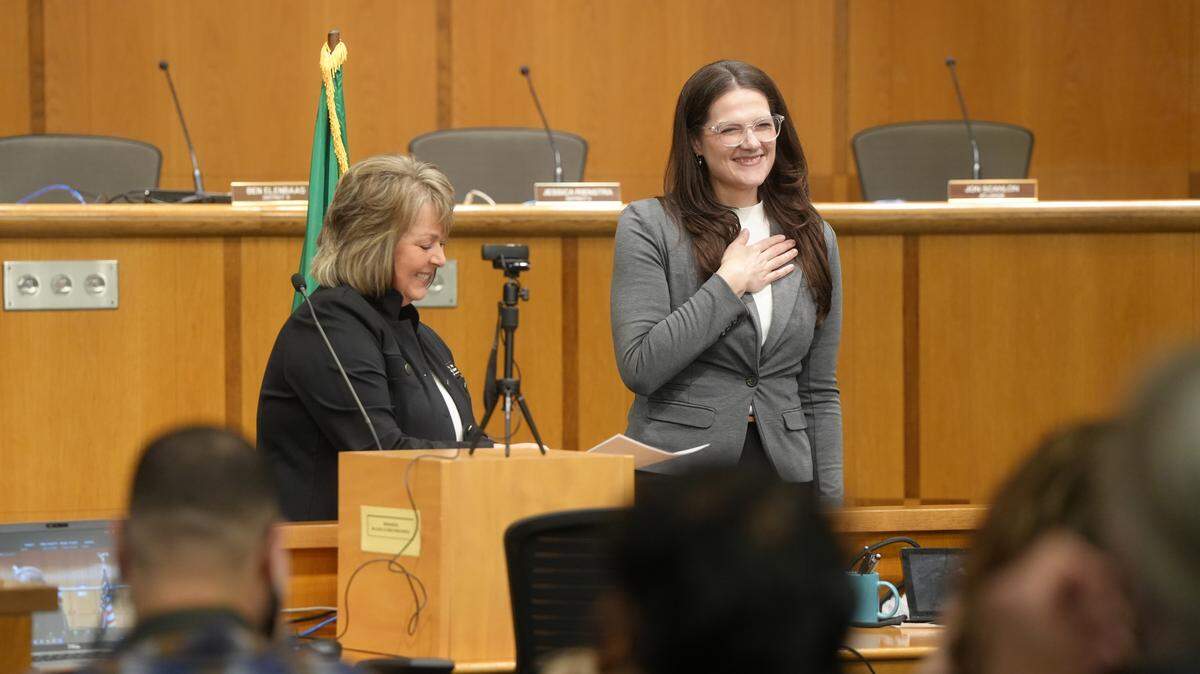 Whatcom County Councilmember Jessica Rienstra (right) participates in the oath of office ceremony Jan. 12. Rienstra was elected to serve her first term on the council representing District 3. Her term ends in January 2030.