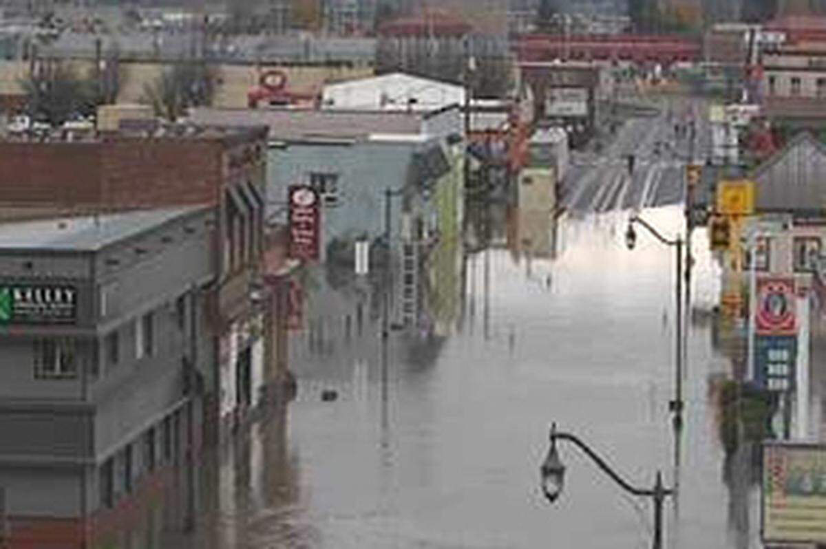 Washington State Department of Transportation cameras show floodwaters from the Nooksack River flowing over Cherry Street at approximately 10:30 a.m. Monday, Nov. 29.