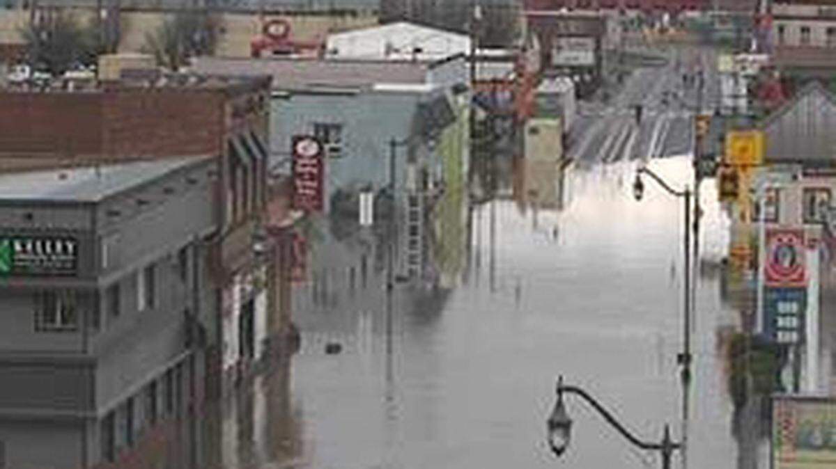 Washington State Department of Transportation cameras show floodwaters from the Nooksack River flowing over Cherry Street in Sumas in 2021, a La Niña year. The National Oceanic and Atmospheric Administration’s Climate Prediction Center said the coming winter will see milder weather associated with the El Niño phenomenon.