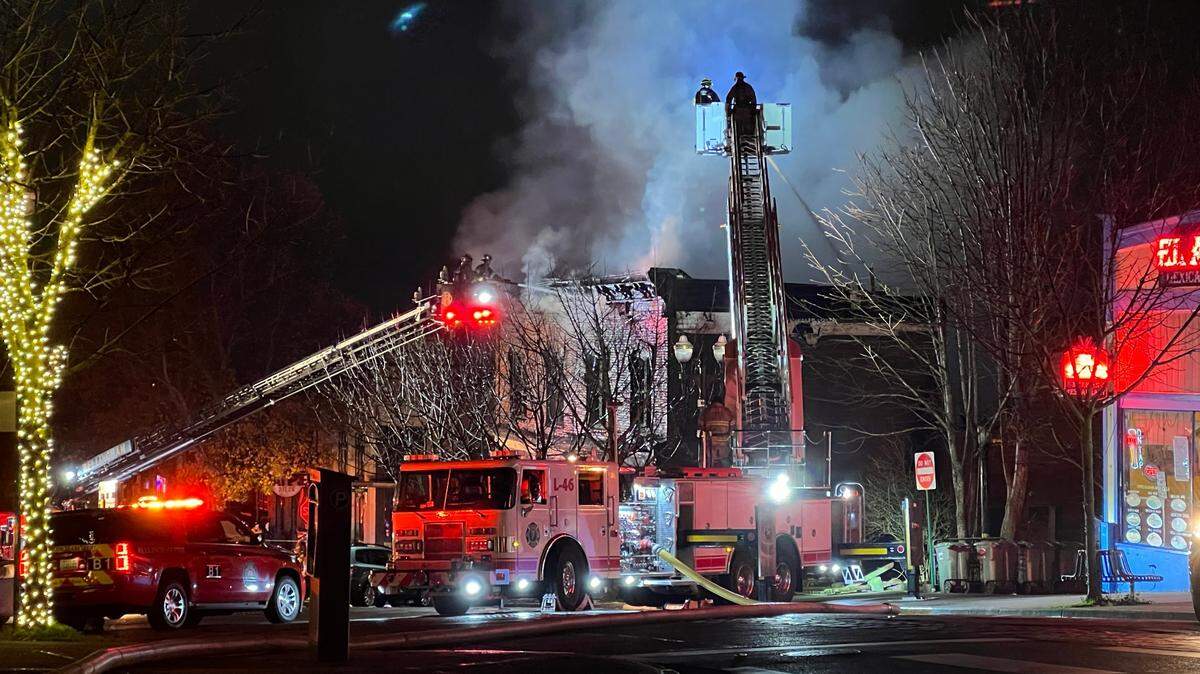 Ladder trucks were used to pour water on top of the fire at Harris Avenue Dec. 17, 2023.