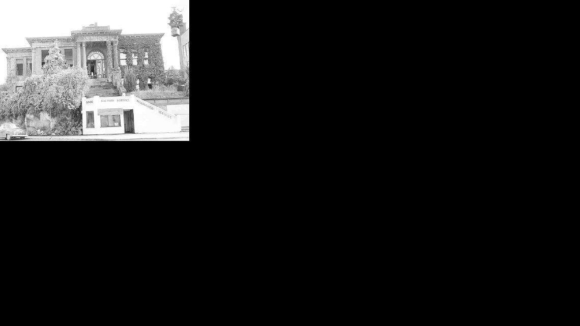 This September 1951 photo shows the Bellingham public library that sat atop a rocky hill at what is now the parking lot next to Crown Plaza Executive Suites. Demolition of the library began that month, weeks after the new main library opened at its current site on Central Avenue.