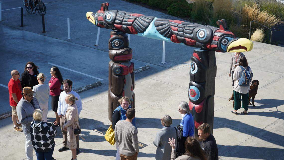 More than 30 people attended the dedication ceremony for the Double Thunderbird at Bellwether Plaza on Thursday, Sept. 22, in Bellingham. Jewel James, head carver with the Lummi Nation’s House of Tears Carvers studio, created the poles, using animals and symbols to tell stories about morality, responsibility and integrity.