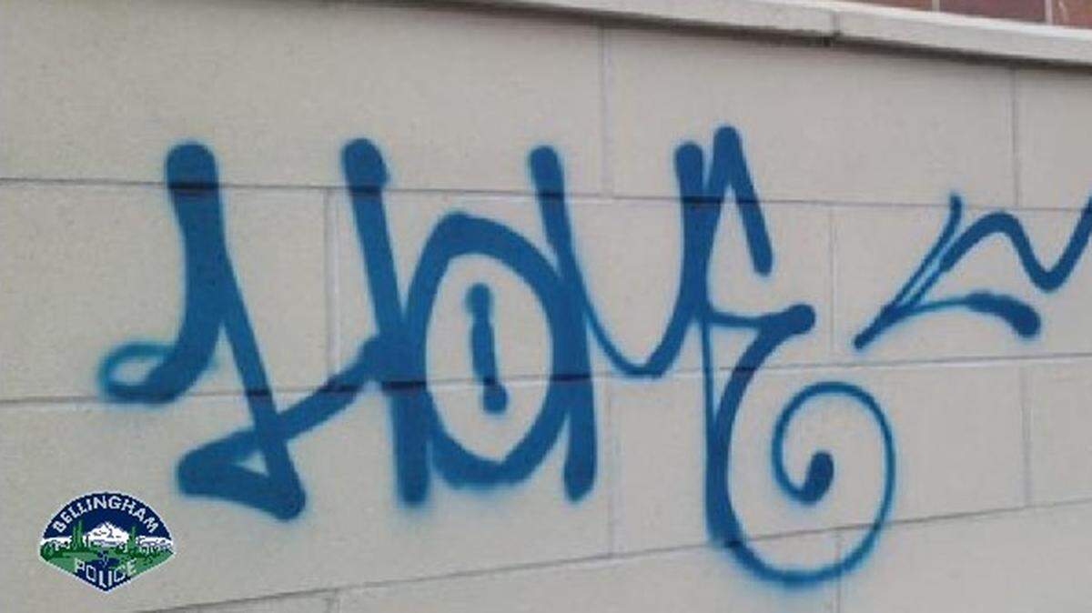 Bellingham Police posted photos of several graffiti tags to their social media pages as part of an announcement about a continuing vandalism investigation, including one that says “Home.”
