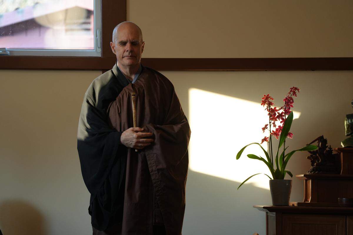Rev. Nomon Tim Burnett leads a silent meditation at Red Cedar Zen Community’s newly opened Sansui-ji (Mountains and Waters Temple) on Sept. 3.