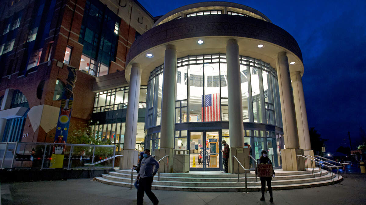 People exit the rotunda of the Whatcom County Courthouse after casting votes in the 2000 general election.