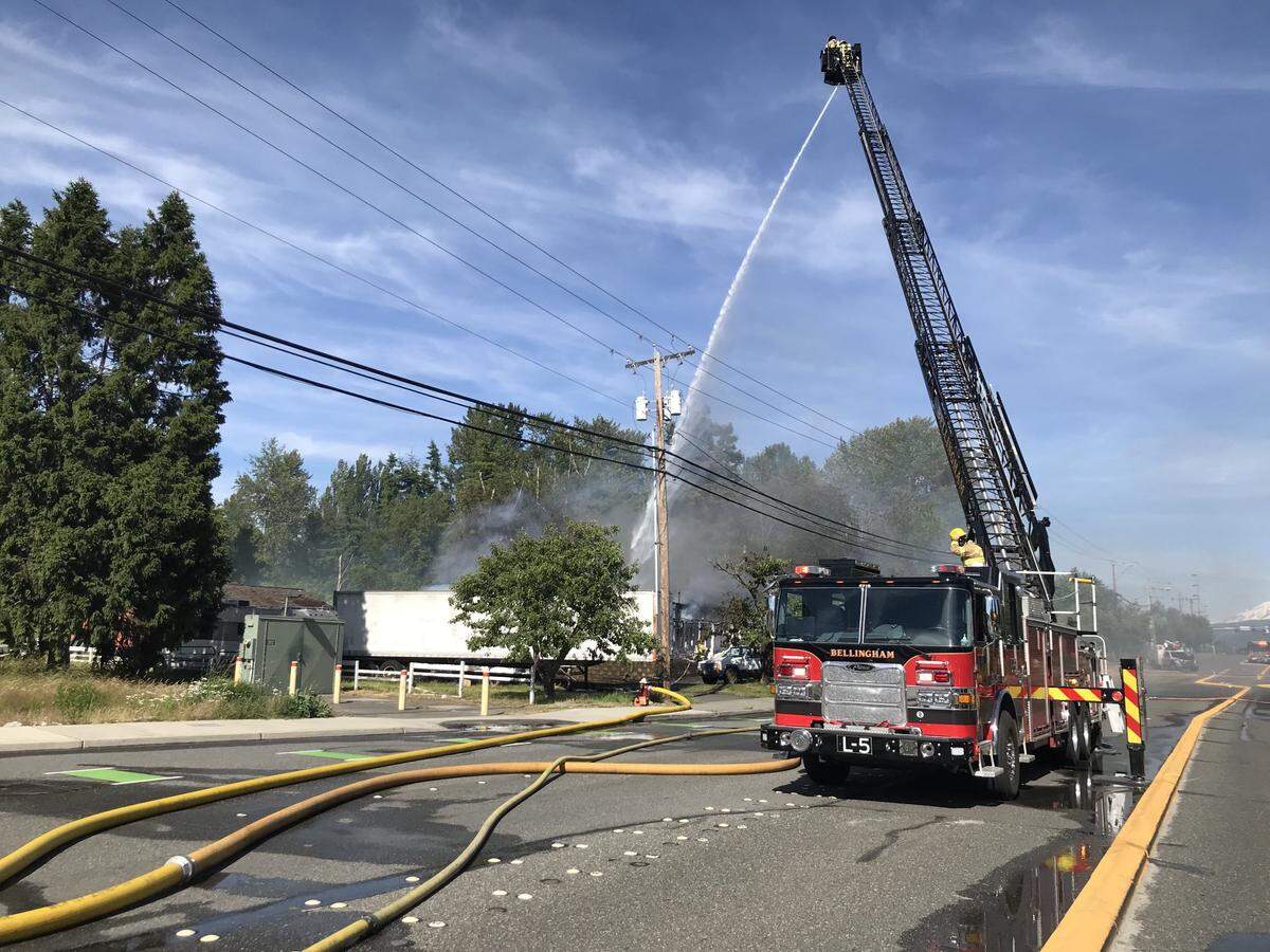Bellingham Fire Department crews fight a house fire Sunday afternoon, June 20, in the 1100 block of West Bakerview Road.