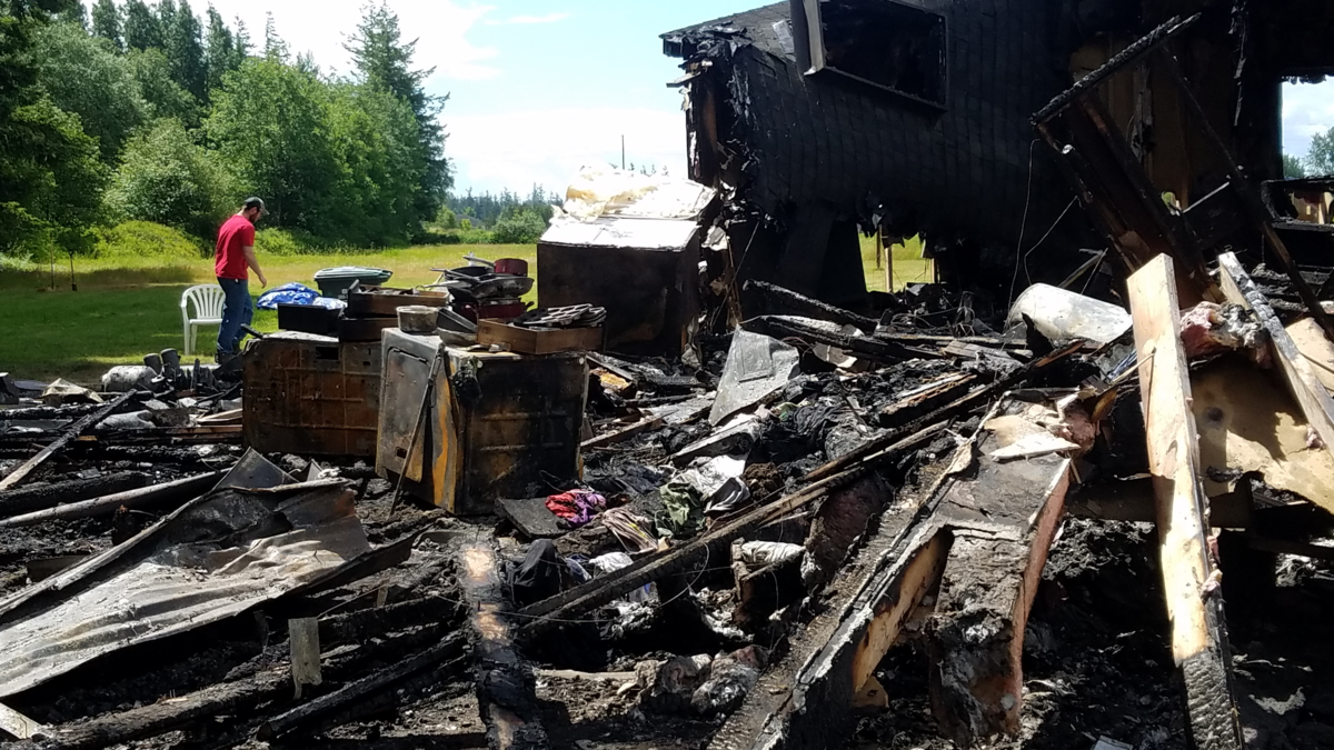 A Whatcom County couple lost their home and dog in a Wednesday fire. Flames were showing when North Whatcom Fire and Rescue was called and the home was a total loss.