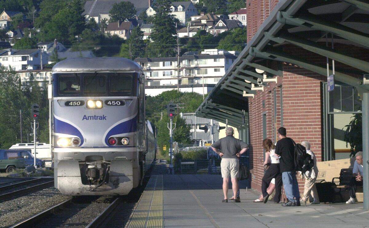 An Amtrak train arrives at the Fairhaven station in 2000 in Bellingham. The popular Amtrak Cascades train service north of Seattle to Bellingham and Vancouver B.C. will not start up until late 2022 because of staff shortages.