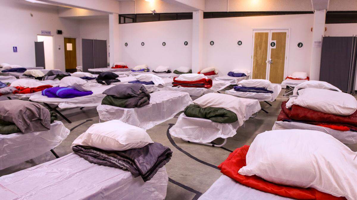 Cots are cleaned and prepared for guests at the Whatcom County Severe Weather Shelter in the Central Lutheran Church at 925 N. Forest St. The shelter has space for up to 70 people.