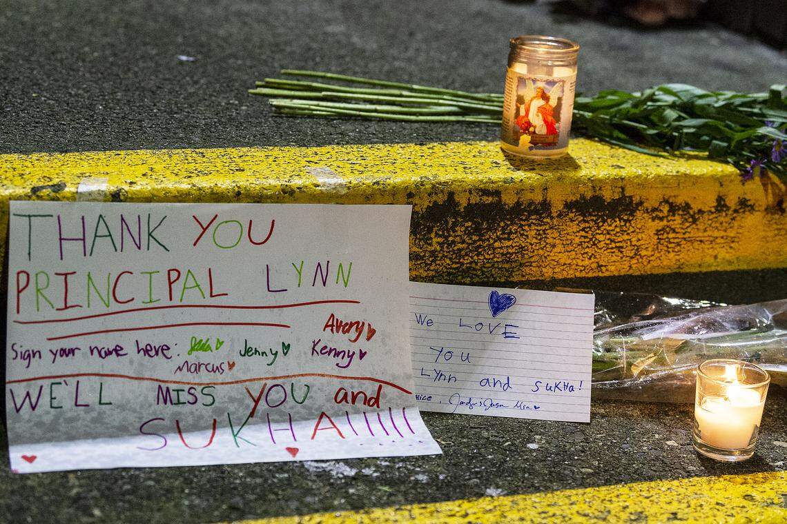 More than 200 students, teachers, parents and administrators attend a vigil for slain school principal Lynn Heimsoth at Sunnyland Elementary School on Friday evening in Bellingham.