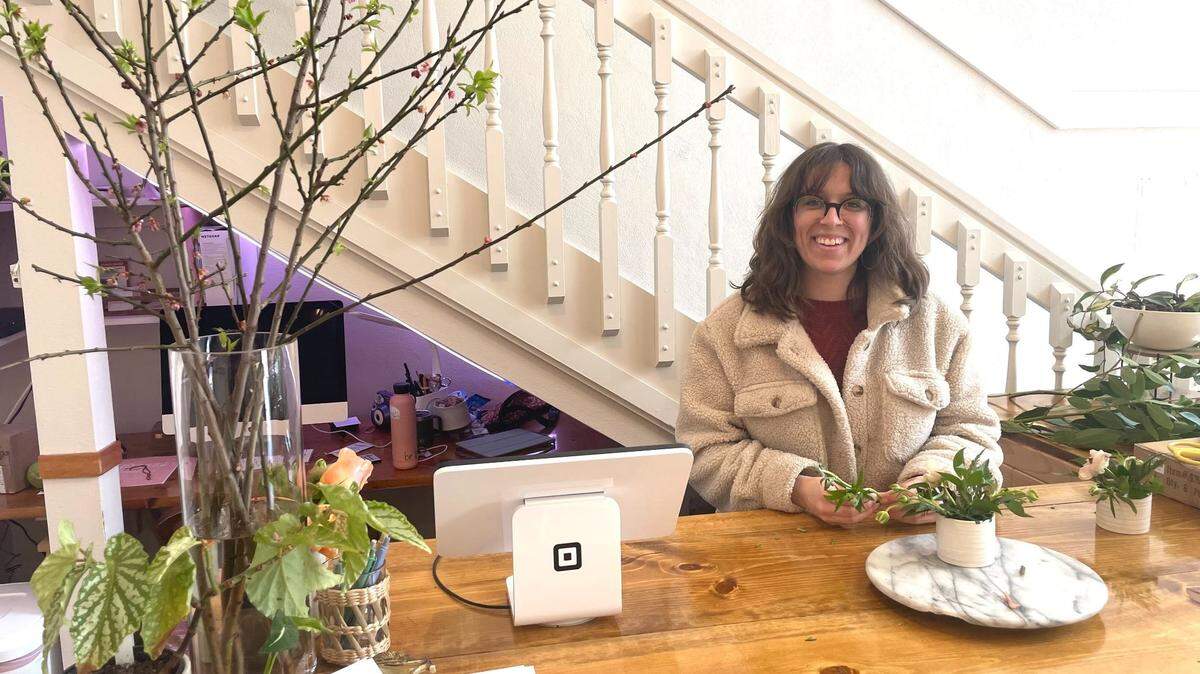 Elyse Parron, owner of Poppy & Pomegranate, makes a bouquet on Wednesday, April 5, at 1003 Harris Ave. in Bellingham.