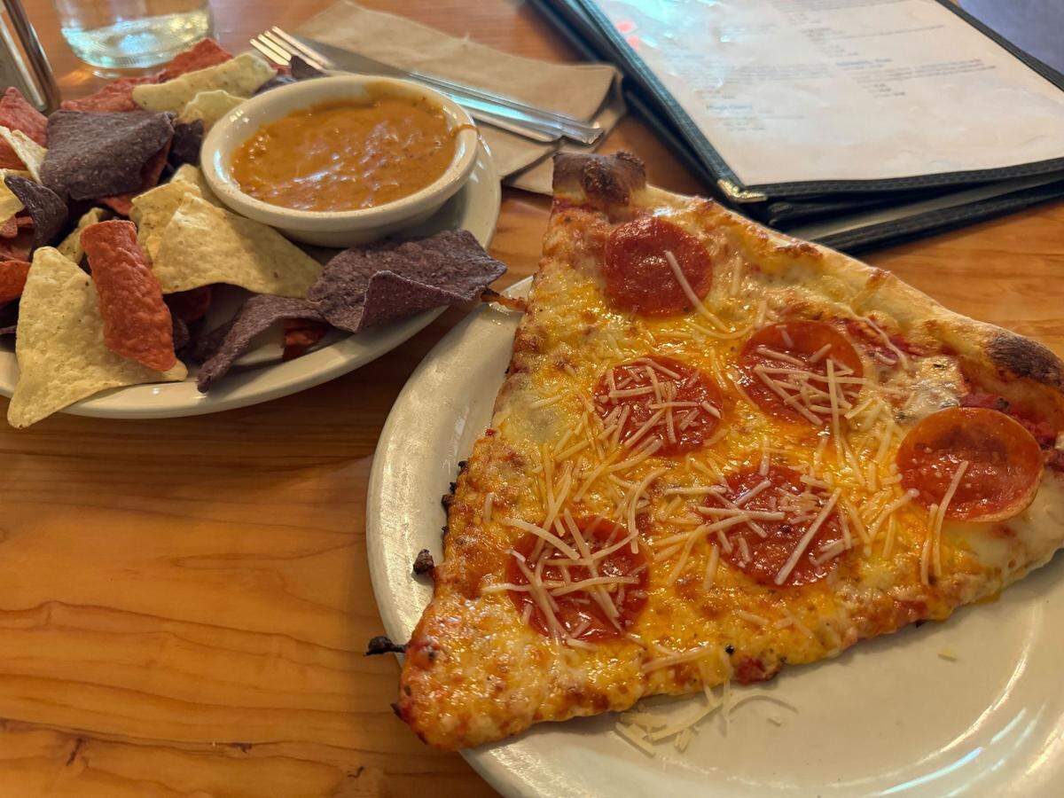 Beer cheese dip and a slice of pepperoni pizza from North Fork Brewery on Wednesday, July 24, 2024 at 6186 Mt. Baker Highway.