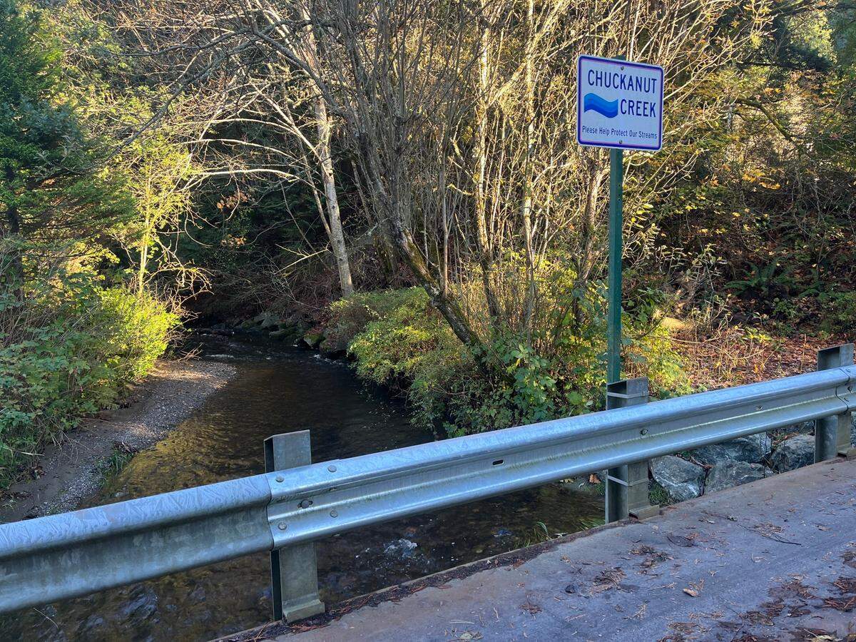 Chuckanut Creek runs under the temporary 19th Street bridge toward Mud Bay.
