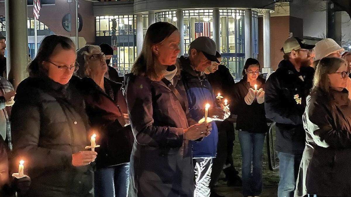 More than 100 people gathered at Bellingham City Hall on Dec. 21, 2023, to observe National Homeless Persons Remembrance Day.
