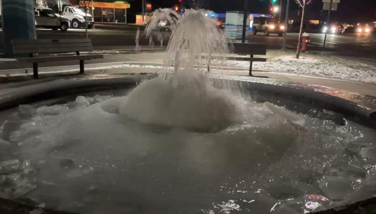 The Fountain District’s iconic fountain at the intersection of Meridian Street and Broadway in Bellingham is partly frozen as nighttime temperatures dropped into the low 20s on Tuesday.