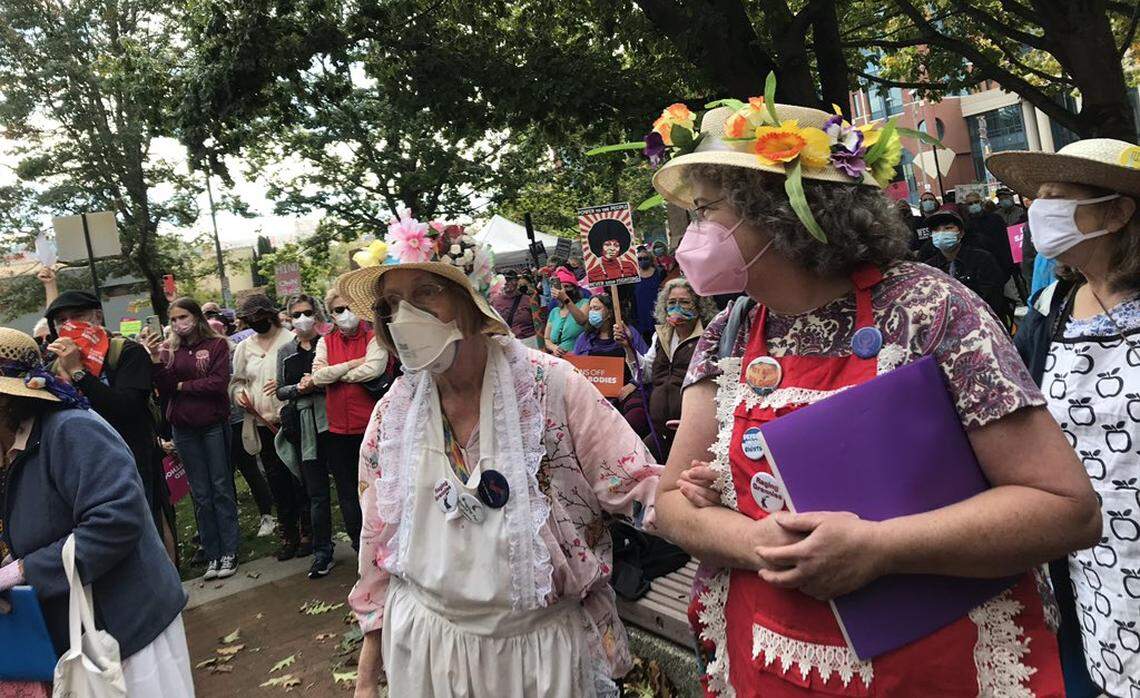 The Raging Grannies sang “Roe, Roe, Roe v. Wade — we thought the deal was done. Verily, verily, verily, verily, our rights may soon be gone” Saturday, Oct. 2, at the Woman’s March at Bellingham City Hall.
